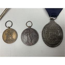 Two silver Georgian tablespoons, approximate total weight 3.36 ozt (104.7 grams), together with Great War Peace Medal 1919 and two others 