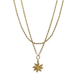 Edwardian gold split pearl flower pendant, stamped 15ct, on long gold rope twist necklace, stamped 9ct