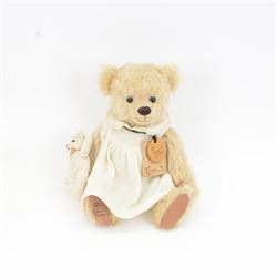 Three limited edition Robin Rive teddy bears to include 'Peace' a yellow mohair bear holding a yellow rose limited edition no.4/200, 'Tuddles' a musical grey mohair bear limited edition no.9/100 and 'Sally & Her Bear' a blonde mohair bear with crocheted teddy bear limited edition no.143/300, all with certificate tags, tallest H41cm 