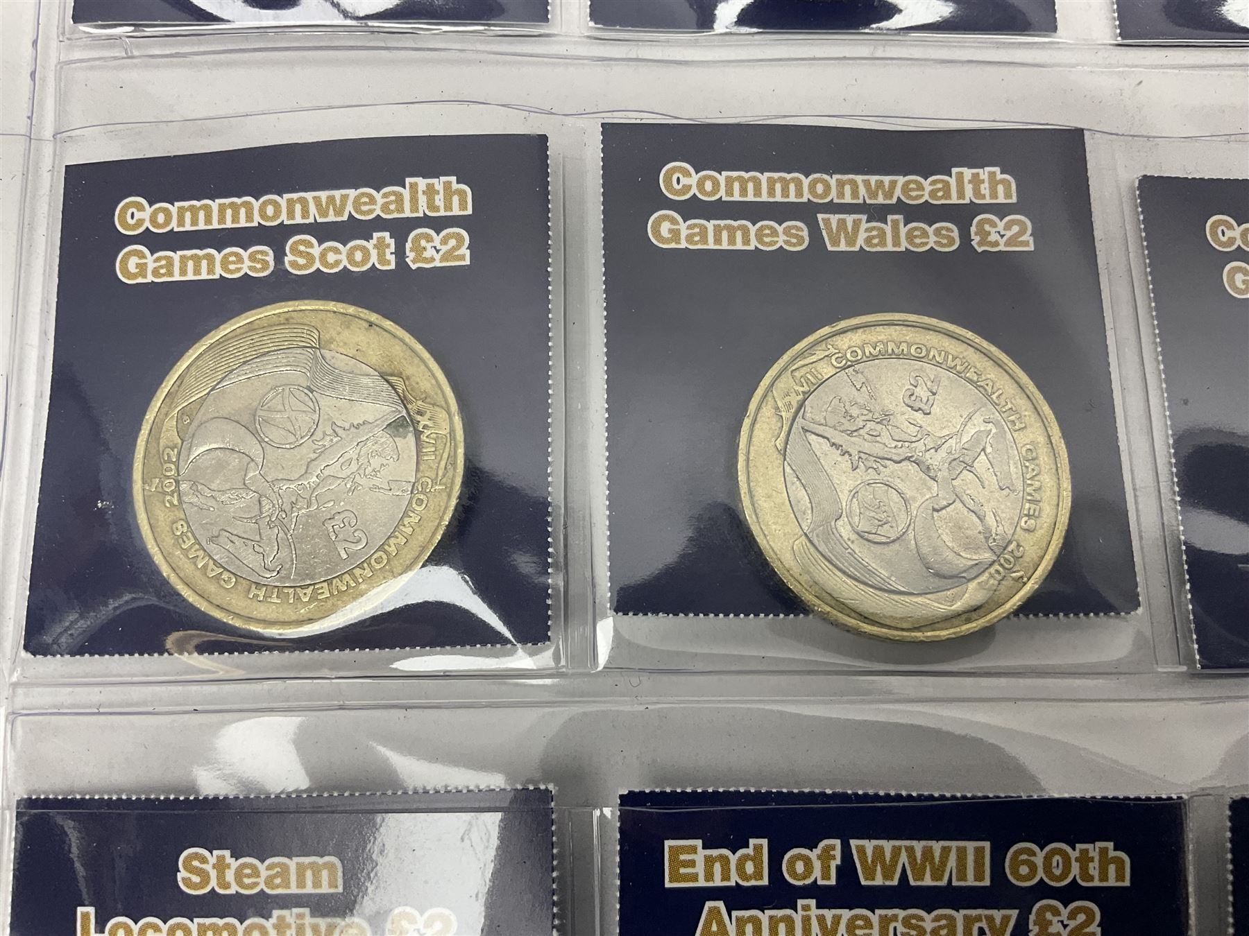 Mostly United Kingdom Queen Elizabeth II commemorative two pound  coins, including 2017 'Jane Austen', 2018 'Sea King', 2018 'Vulcan' etc face value of UK coins approximately 98 GBP