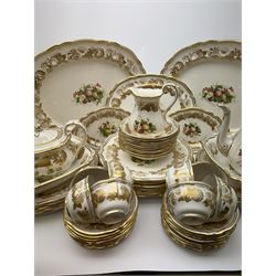 Extensive Spode dinner and tea service, decorated in the Golden Valley pattern, comprising eighteen dinner plates, ten salad plates, ten side plates, ten twin handled soup bowls and ten saucers, ten bowls, two sauce boats and two stands, two square serving dishes, smaller oval serving dish, two tureens and covers, two large oval serving platters, one smaller example, teapot, coffee pot, milk jug, twin handled lidded sucrier, and ten teacups and ten saucers, with red printed marks beneath 