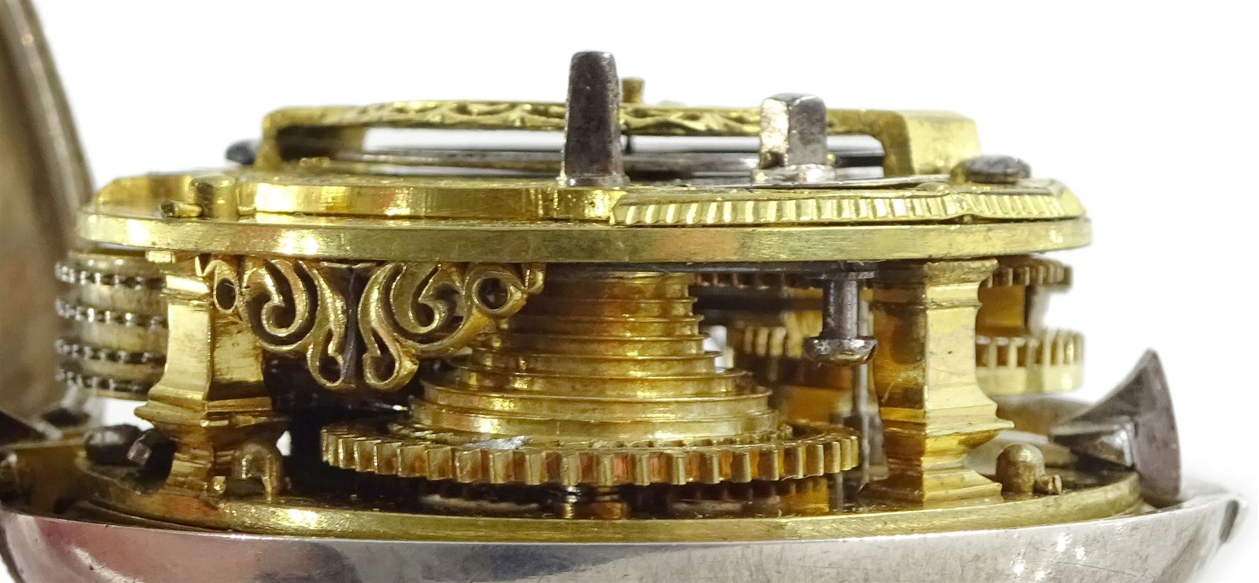 Early George III silver repousse pair cased verge fusee pocket watch by Samuel Weldon, London, No. 24807,  square baluster pillars, pierced and engraved balance cock, white enamel dial with Roman hours and outer Arabic minute ring, Louis XIV hands, bull's eye glass, inner case marked D. P, London 1761, the  outer case depicting figures in a garden setting with scroll borders