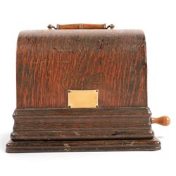 Early 20th century Edison GEM phonograph, in oak case, serial number 237880, with brass horn and a collection of wax cylinders