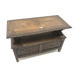  Early 20th heavily carved oak monks bench, hinged lid, stile supports, W107cm, D72cm, D51cm  