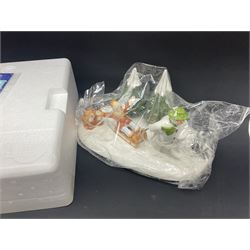 Three Coalport Characters The Snowman figures, comprising Dinner for Two, Off Piste and Winter Fun, all with certificates and original boxes 