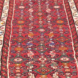 North west Persian hand-knotted Malayer runner, vibrant rose field with an all-over lattice design of lozenges and stylised floral motifs, ivory spandrels within a zig-zag main border flanked by multiple guard stripes 