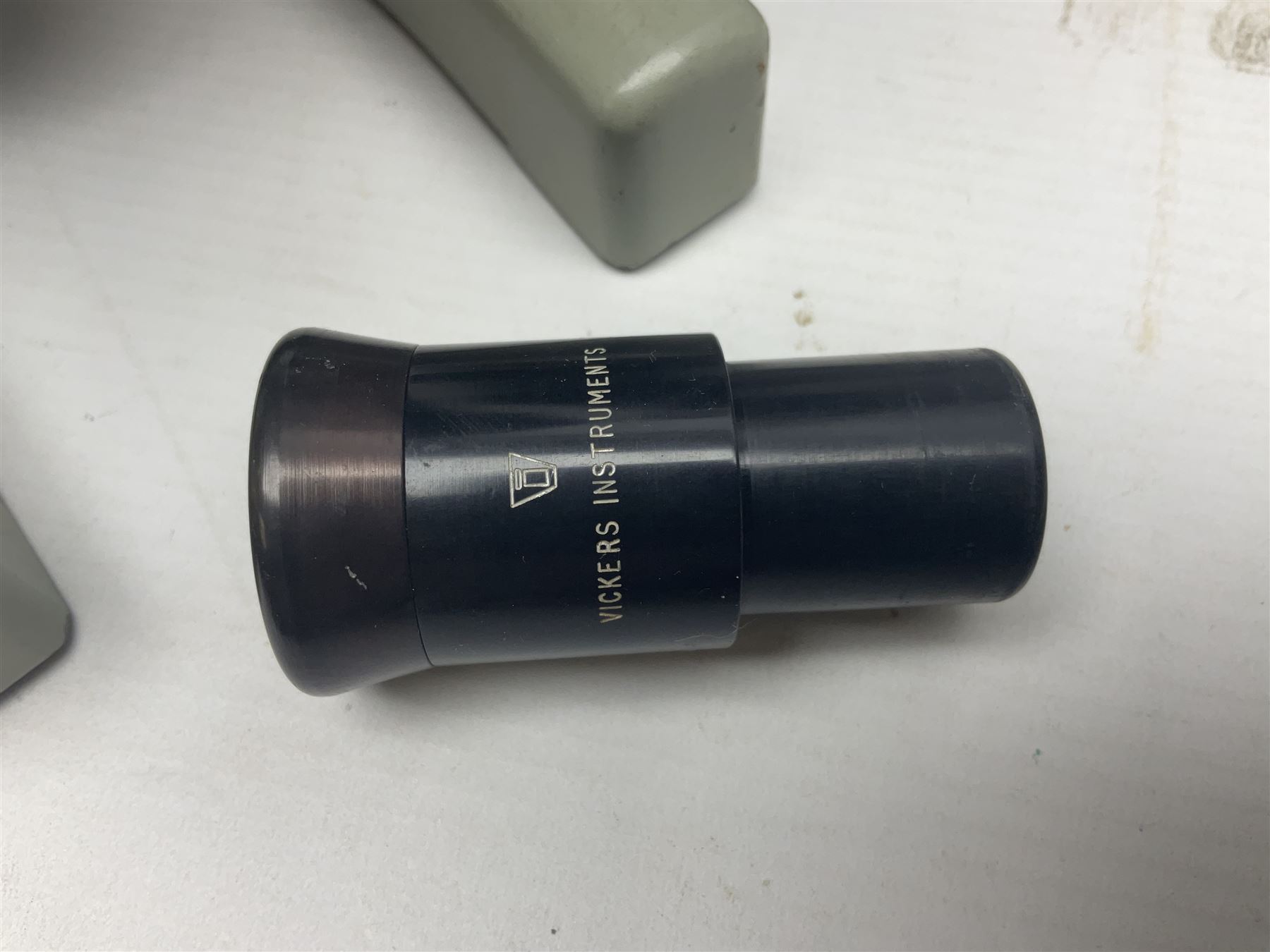 Four microscopes, comprising C Baker London Vickers, Back Diamax no 40956, Opax ABF no 232733 and one other 