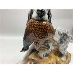 Royal Doulton model of an English setter carrying a pheasant, HN 2529, designed by Frederick Daws, H21cm