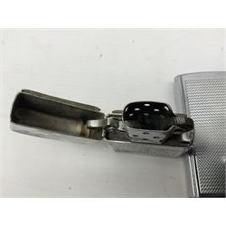 Collection of lighters, including Ronson Varaflame, Zorr Classic, Dunhill bark effect roller gas lighter, and faceted blue glass table lighter, etc