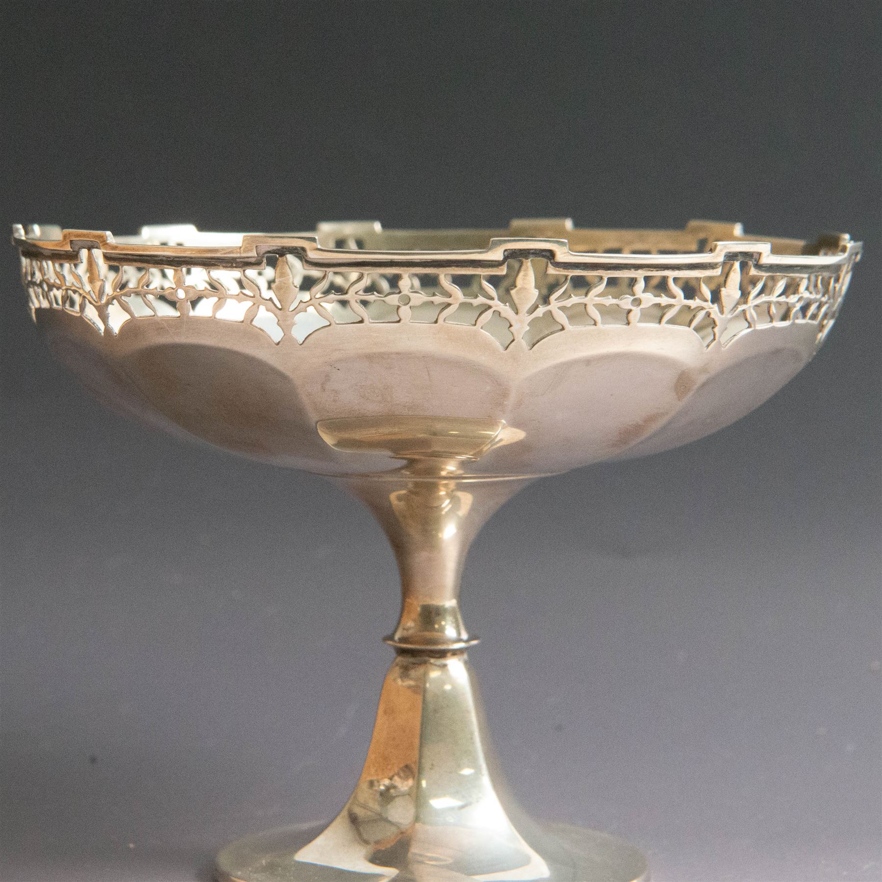 Early 20th century silver tazza, the bowl of circular form with pierced foliate border, upon and knopped stem and circular foot, hallmarked 	Marcus Beaver, Birmingham 1913, H11cm, D15cm
