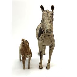 Two Edith Reynolds hand-made and rubber filled real skin horses, largest H26cm. 