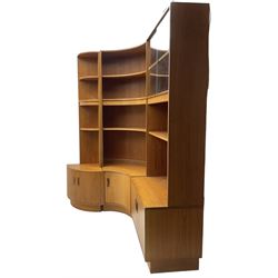 G-Plan - teak three sectional wall unit, fitted with display cabinet enclosed by two sliding glass doors, shelves and cupboards