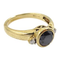 9ct gold bezel set black diamond ring, with a white brilliant cut diamond set each side, hallmarked