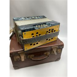 Small German Alvari piano accordion with blue pearline case, thirteen keys and eight buttons L30cm; in carrying case