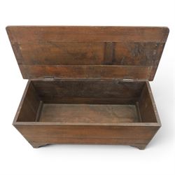 19th century oak boarded blanket box, with chip-carved edges, raised on shaped cut away bracket supports