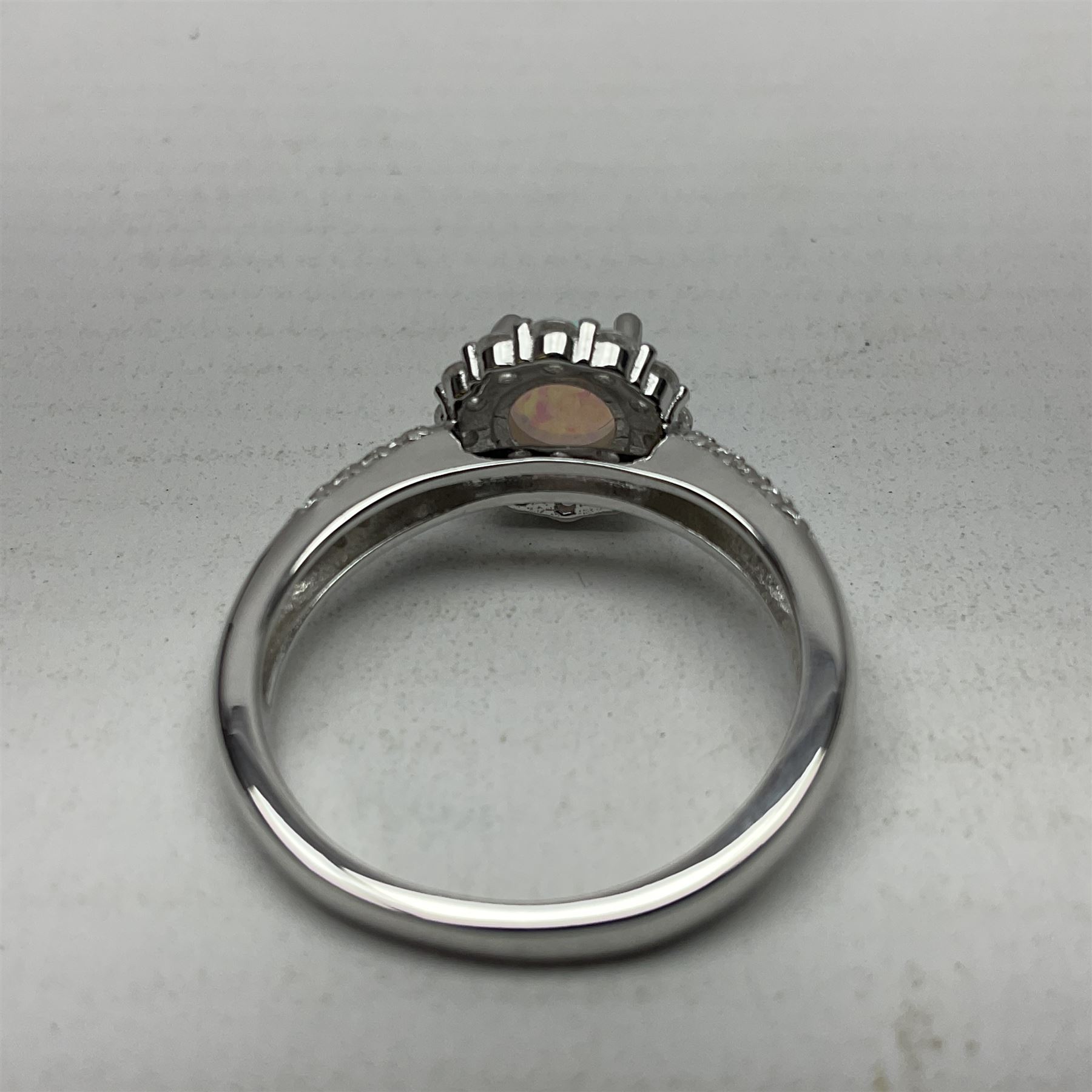 Silver opal and cubic zirconia cluster ring, stamped 925, boxed