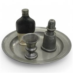 Collection of early 19th century and later British pewter, mostly London label marks, including two large pewter chargers, medicine spoon, flasks, plates and other tableware