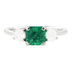 18ct white gold emerald and diamond three stone ring, single modified square cut emerald o...