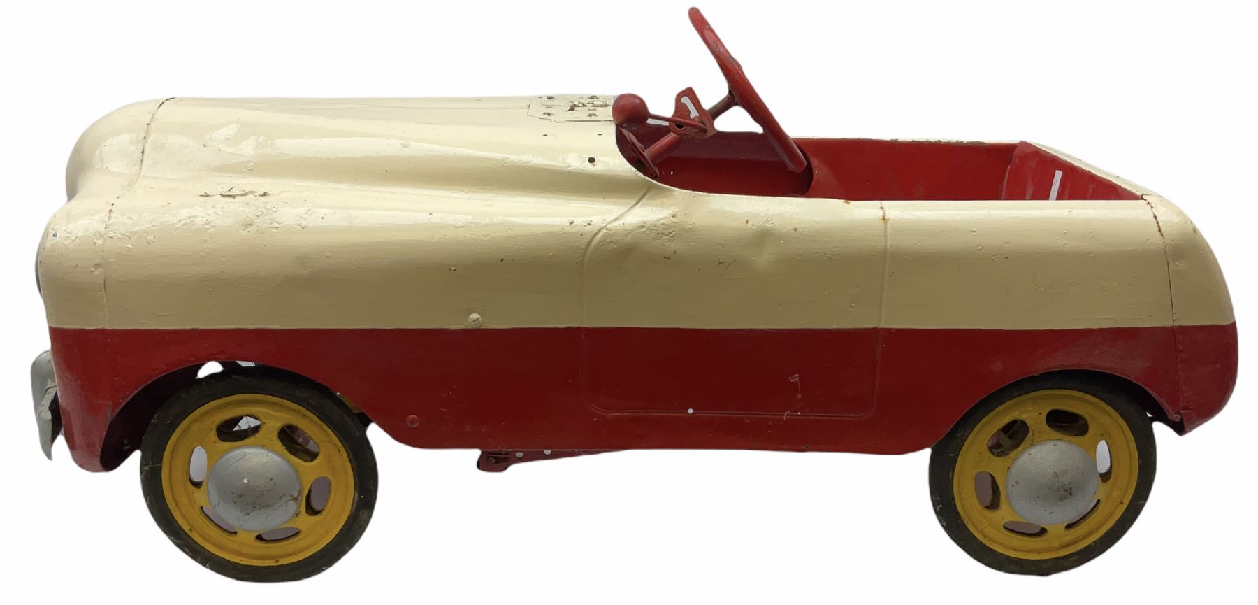 1950s child's tin-plate pedal car, possibly by Tri-ang, painted white and red and named 'Crusader' L104cm