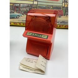 Berwick Toys High Street Shops layout with well-stocked sweet shop and post office; H.C.F. Build A Farm set; and Jukepet battery operated miniature jukebox; all boxed (3)