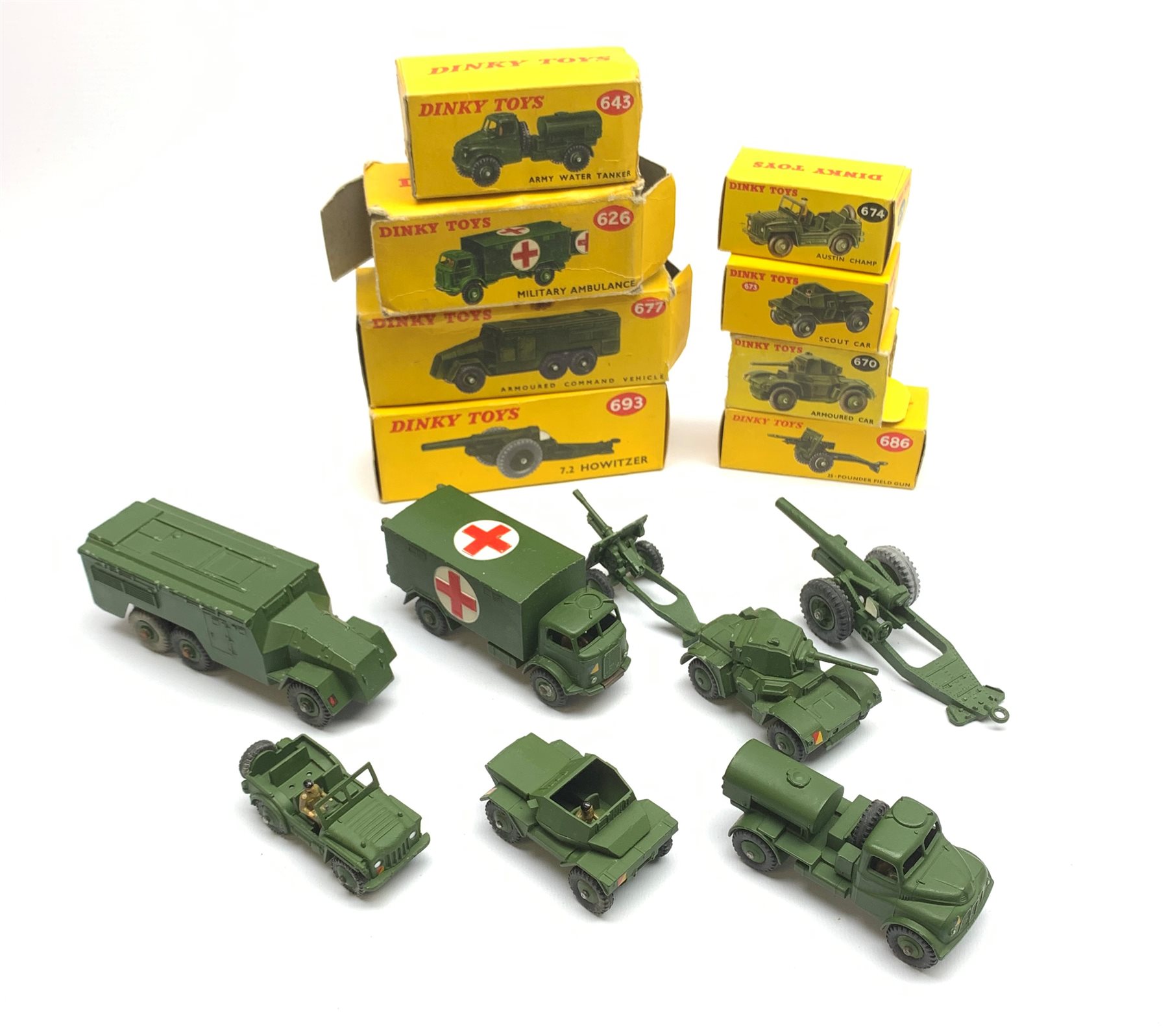 Dinky - eight military vehicles comprising 7.2 Howitzer No.693, Armoured Command Vehicle No.677, Military Ambulance No.626, Armoured Car No.670, 25-Pounder Field Gun No.686, Austin Champ No.674, Army Water Tanker No.643 and Scout Car No.673, all boxed (8)