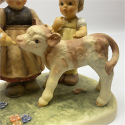 Large Hummel figure group by Goebel, Farm Days, modelled as four children feeding a calf, limited edition 2980 of 5000, H18cm