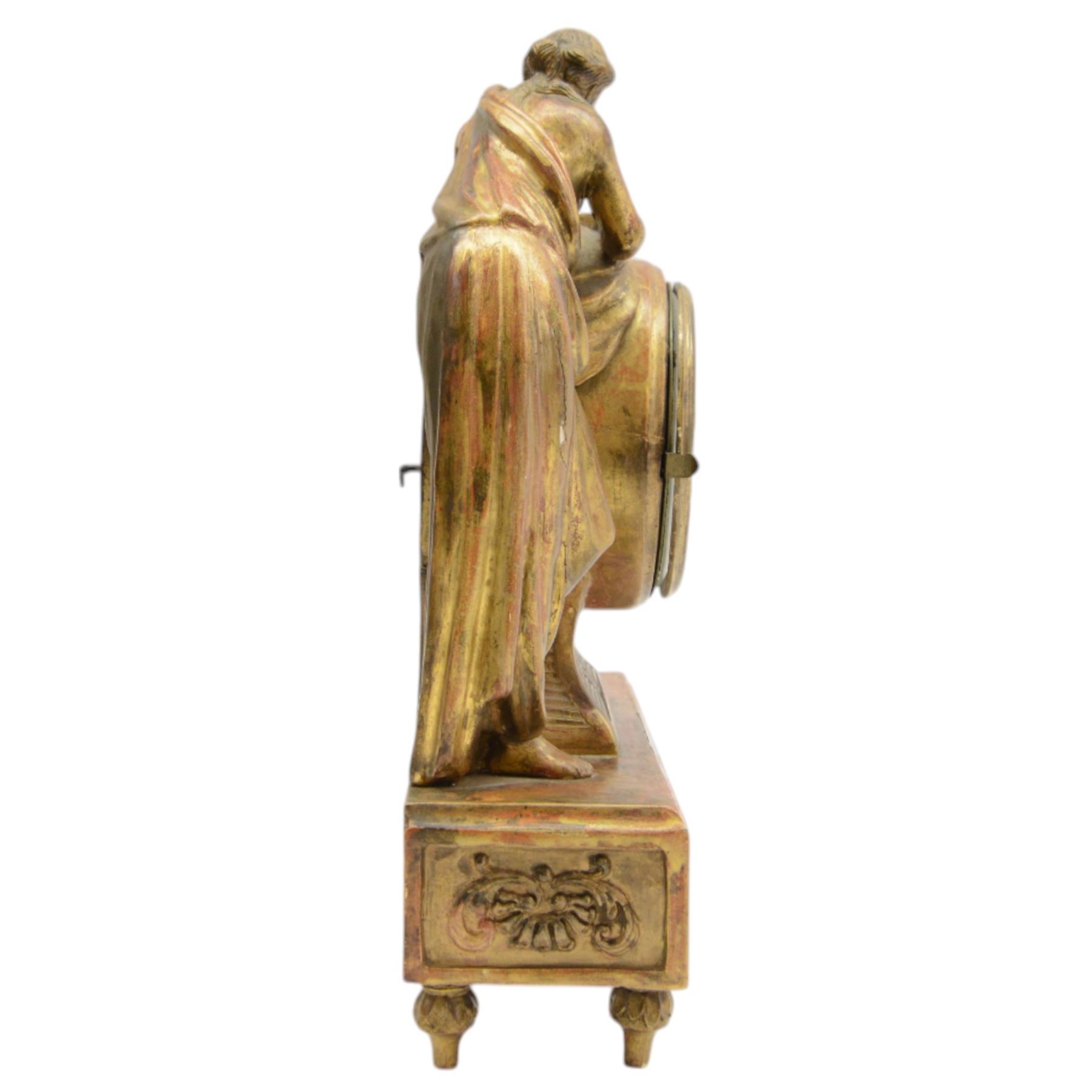 John Michael Hofer in Wien - Austrian 19th century 8-day mantle clock with calendar c1820, carved wooden case with a red fontenay base and a gilt paint finish, rectangular plinth raised on turned feet with recessed carving to the front, classical urn and figure of a maiden resting over the drum movement, enamel dial with Arabic numerals for the hours, quarter minutes and calendar date, with finely pierced gilt hands and a contrasting steel centre sweep calendar hand, twin train movement with a silk suspension and rack striking, sounding the hours on a bell. With pendulum.