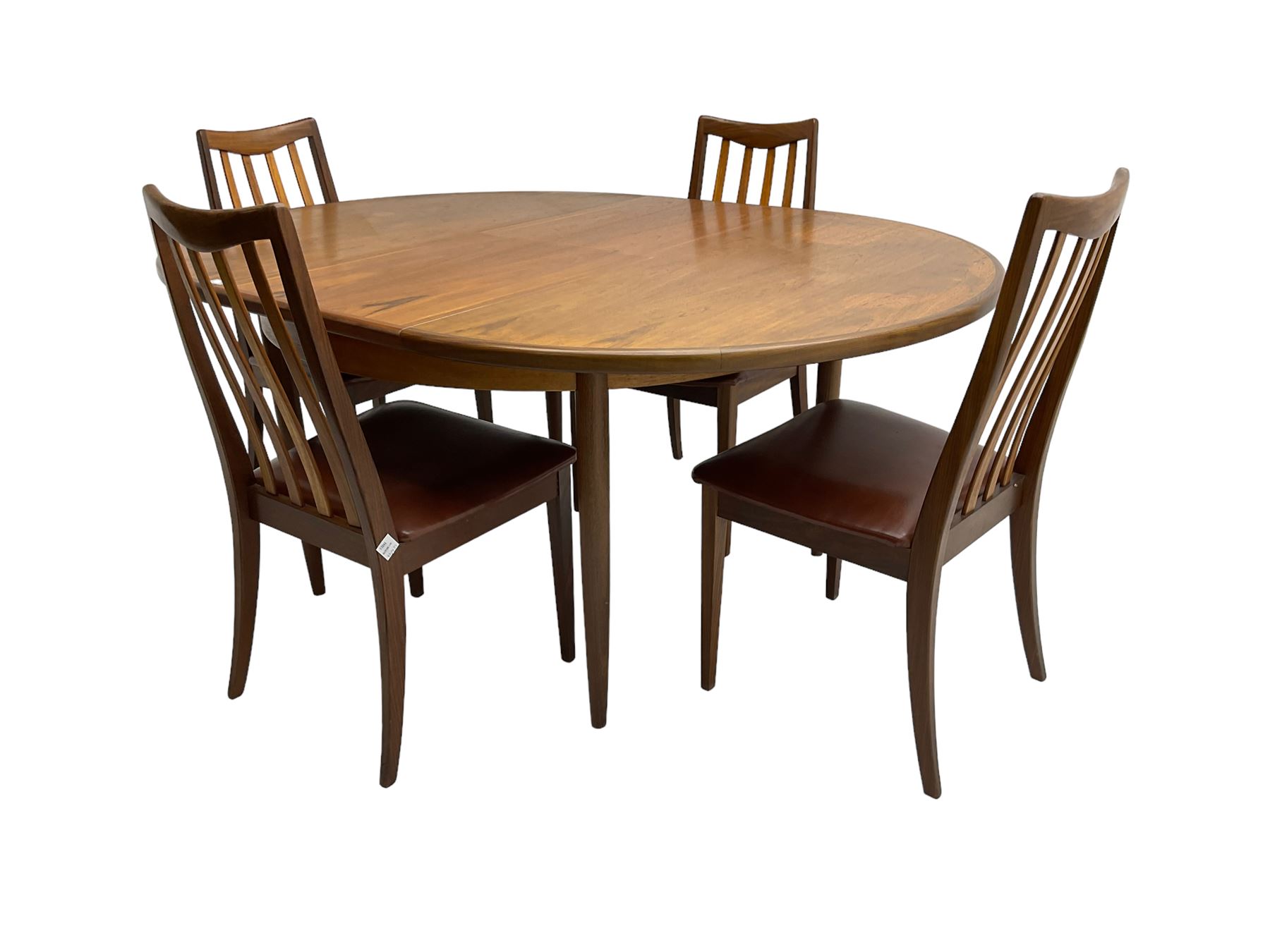 G-Plan - mid-20th century teak 'Fresco' extending dining table, circular top on tapered supports (W122cm H74cm); and Leslie Dandy for G-Plan - set six mid-20th century teak 'Fresco' dining chairs, high backs over tan leatherette seats (W46cm H91cm)