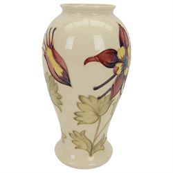 Moorcroft Columbine pattern vase, of baluster form on a cream ground, H26cm