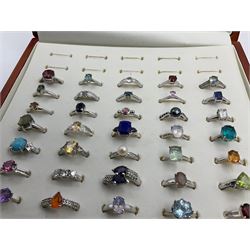 Silver Collector Rings Forty silver stone-set rings, including ruby, topaz, pearl, labradorite ...