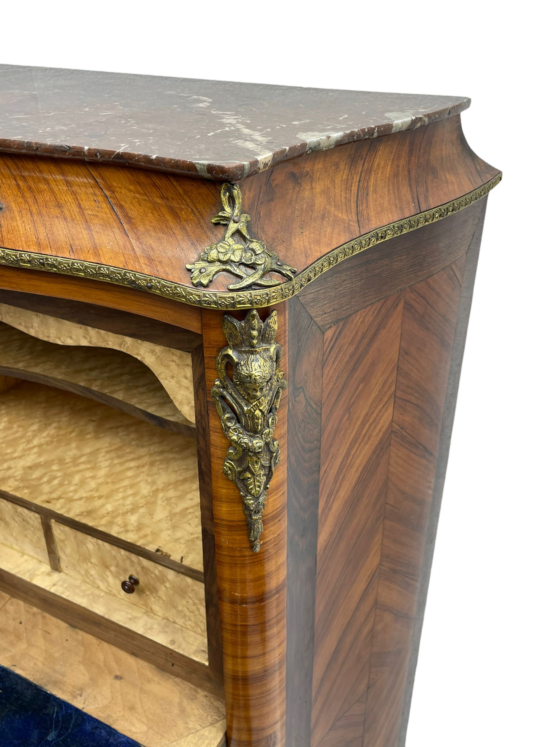 Mid-20th century Louis XVI design Kingwood and walnut secretaire à Abattant, shaped serpentine form with dark rouge variegated marble top, the fall front disguised as three drawers enclosing birdseye maple interior with shelf, drawers and writing surface, four functioning drawers below, decorated with cast gilt metal mouldings and mask cartouches, on skirted base with egg and dart moulded gilt metal edge