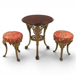 Britannia style cast iron pub table and pair of stools, moulded circular top raised on a g...