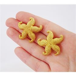 Pair of gold starfish stud earrings