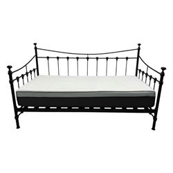 Contemporary Victorian revival black metal day bed, featuring arched back and sides with turned finials and spindle rails, complete with single 'OTTO' mattress