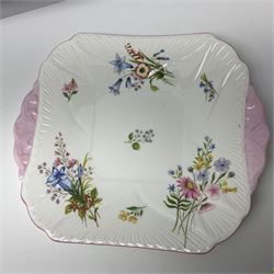 Shelley Wild Flowers pattern part tea service, comprising four cups and saucers, four dessert plates, cake plate, milk jug and open sucrier