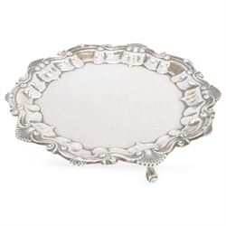 Edwardian silver waiter, of typical form with palmette and C scroll rim, upon three scroll feet, hallmarked Chester 1909, maker's mark MEB over FEB, W23cm