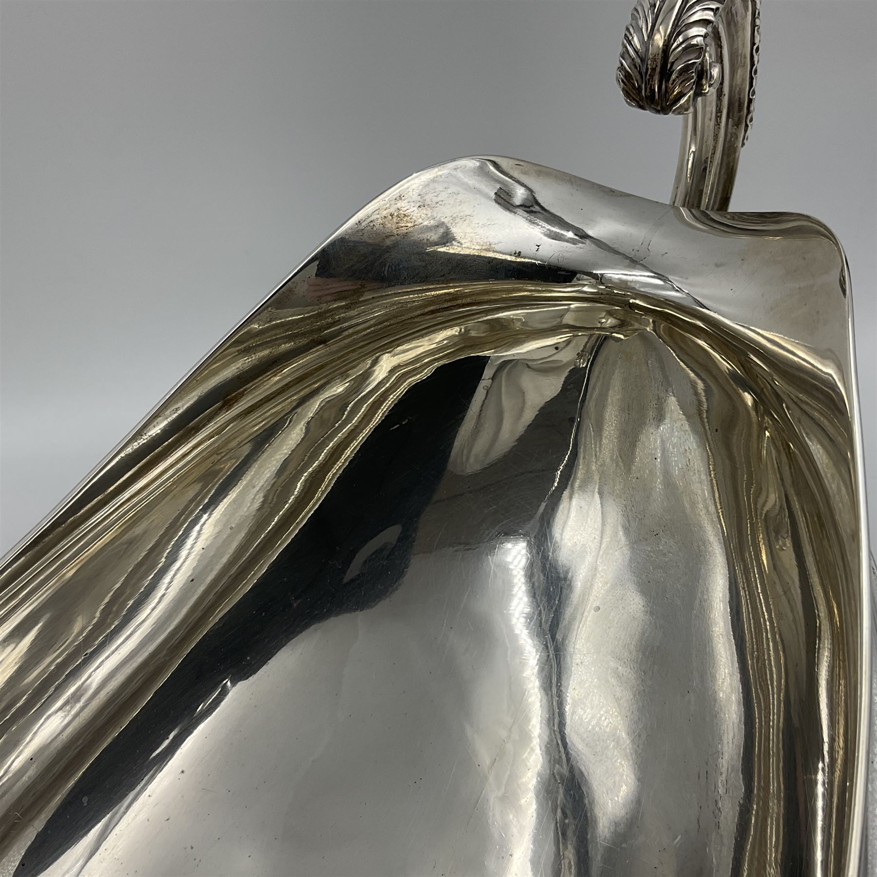 1920s silver twin-handled pedestal bowl, of navette form with twin bifurcated acanthus capped scroll handles, engraved with initial R to body and upon spreading oval foot, hallmarked Hawksworth, Eyre & Co Ltd, Sheffield 1925, including handles H21.8cm