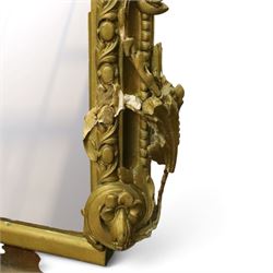 Large Country House late 19th century gilt framed overmantel mirror of arched form, the cartouche and scallop shell pediment over an egg-and-dart and beaded frame, the lower spandrels of scrolling foliate form with acanthus and flower head motifs