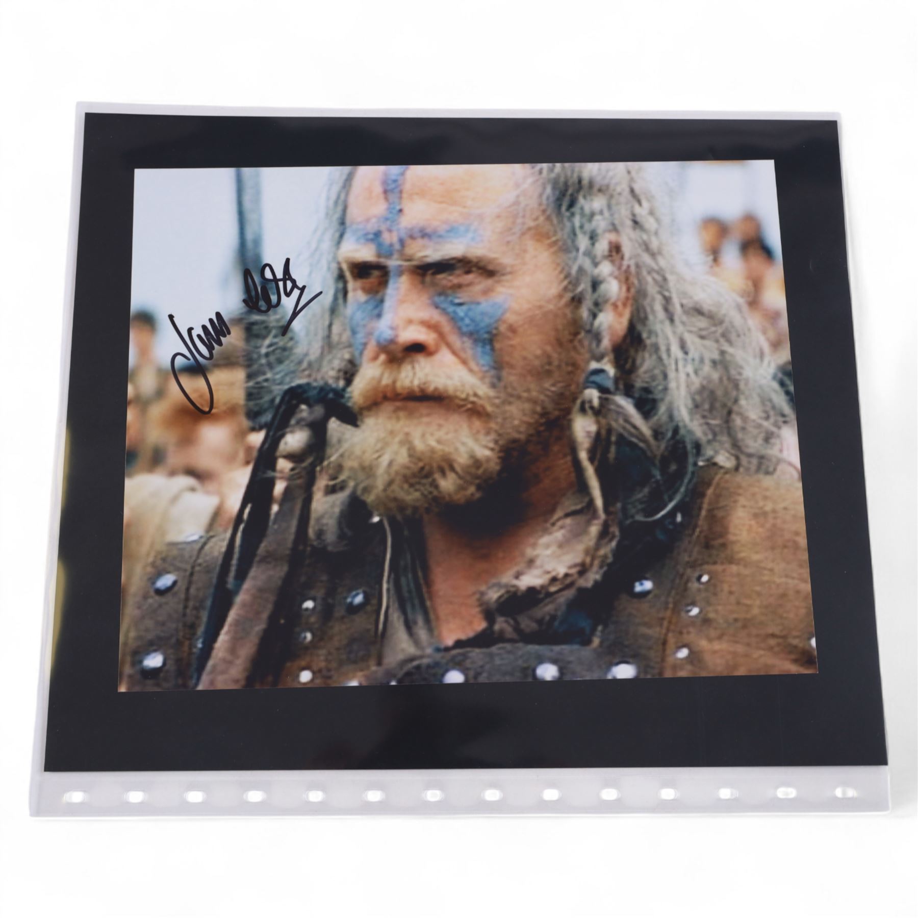 Collection of signed stills and promotional photographs, mostly Sci-Fi TV and film related, including Andy Serkis, Warwick Davis, James Earl Jones, Leroy James, Leonard Nimoy, Billy West, Robert Vaughn, Shane Rimmer, Ethan Phillips etc, all with certificates of authenticity, contained within dark green album