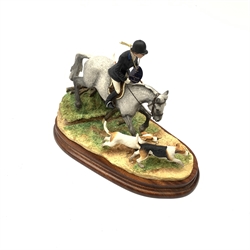 A limited edition Border Fine Arts figure group, Following To Hounds, model no B0951A by Anne Wall, 395/750, on wooden base, figure H19cm, with accompanying certificate. 