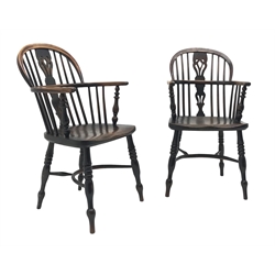  Pair 19th century yew and elm Windsor chairs, traditional twin hoop construction with pierced vase shaped splats and shaped seats on turned supports with crinoline stretchers, probaby North East Midlands or Lincolnshire, (2)  
