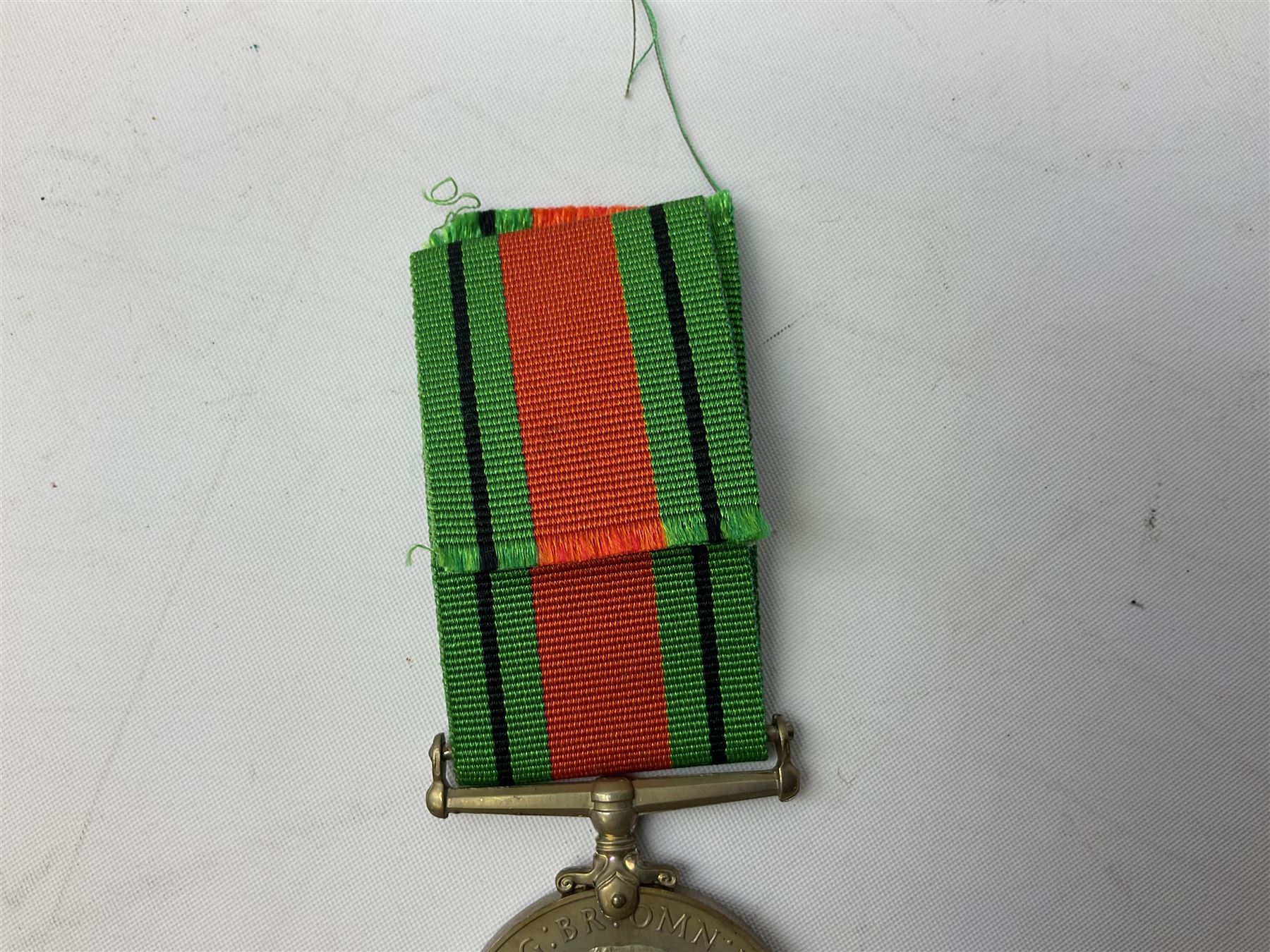 WW1 group of three medals comprising British War Medal and Victory Medal in issue box and Ceylon Volunteer Service Medal awarded to 10288 Pte. M. Smith R. Fus.; together with a later awarded WW2 Defence Medal in modern box with slip; and his QEII Imperial Service Medal in case and box with certificate dated 1959