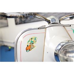 1957 Zündapp Bella R154 Scooter

• Registration: 150 KPU
• Year: 1957
• Model: Bella R154
• Engine: 150cc two-stroke single-cylinder petrol
• Transmission: Four-speed manual
• Odometer reading: 1,727 miles
• Colour: Ivory
• Seating: Dual seat
• V5C: Present
• Original registration book: Present
• Keys: 1

A characterful 1957 Zündapp Bella R154 scooter, finished in ivory with a contrasting brown dual seat and displaying an odometer reading of 1,727 miles.

The Bella R154 formed part of Zündapp’s distinctive range of German touring scooters, combining a 150cc air-cooled two-stroke engine with four-speed transmission, large wheels and substantial pressed-steel bodywork. This example retains its enclosed front apron, central headlamp, chrome handlebars, brightwork, period VDO speedometer and decorative Bella badging.

An operation and maintenance manual is include and accompanied by its V5C and original registration book from 1957.

This vehicle forms part of the Estate of the Late John Sills and is offered for sale by the Executors, confirming a genuine reason for sale.
