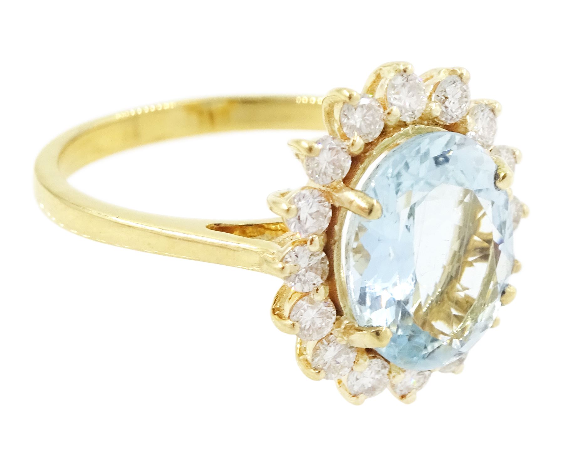 18ct gold aquamarine and diamond cluster ring, single oval cut aquamarine of approx 2.05 carat, surrounded by sixteen round brilliant cut diamonds, stamped, total diamond weight 0.40 carat