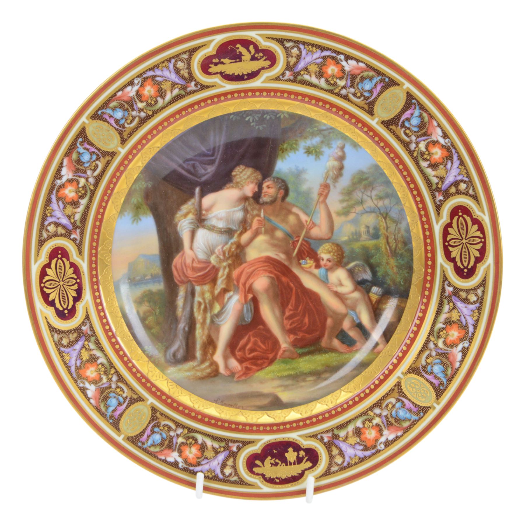 Royal Vienna plate, featuring Hercules and Omphale, the rim decorated with floral and gilt motifs, blue beehive mark beneath, D25cm