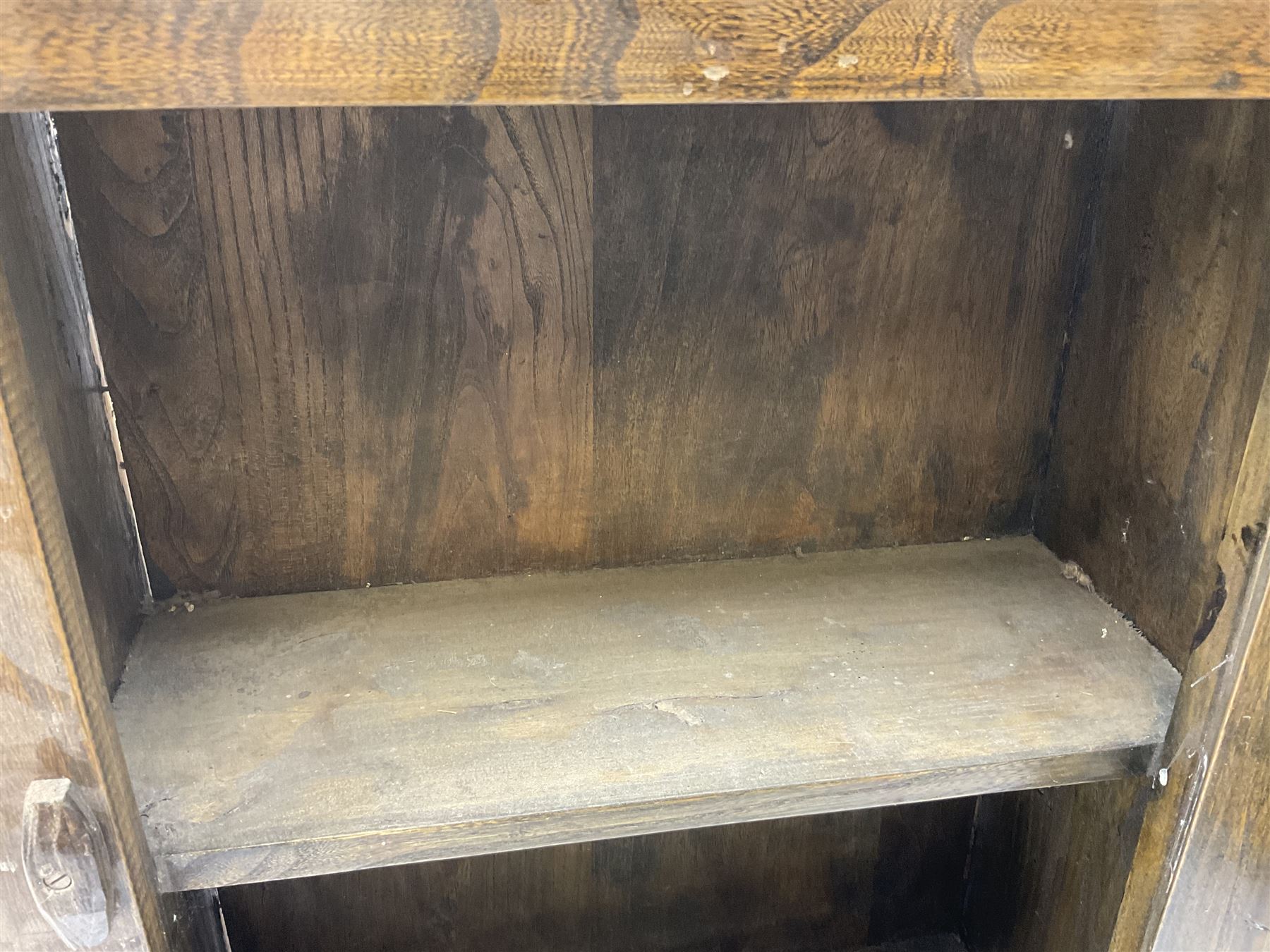 Oak dole cupboard / food hutch, the hinged panelled door with turned spindles enclosing a single shelf interior, H52cm D17cm W46cm