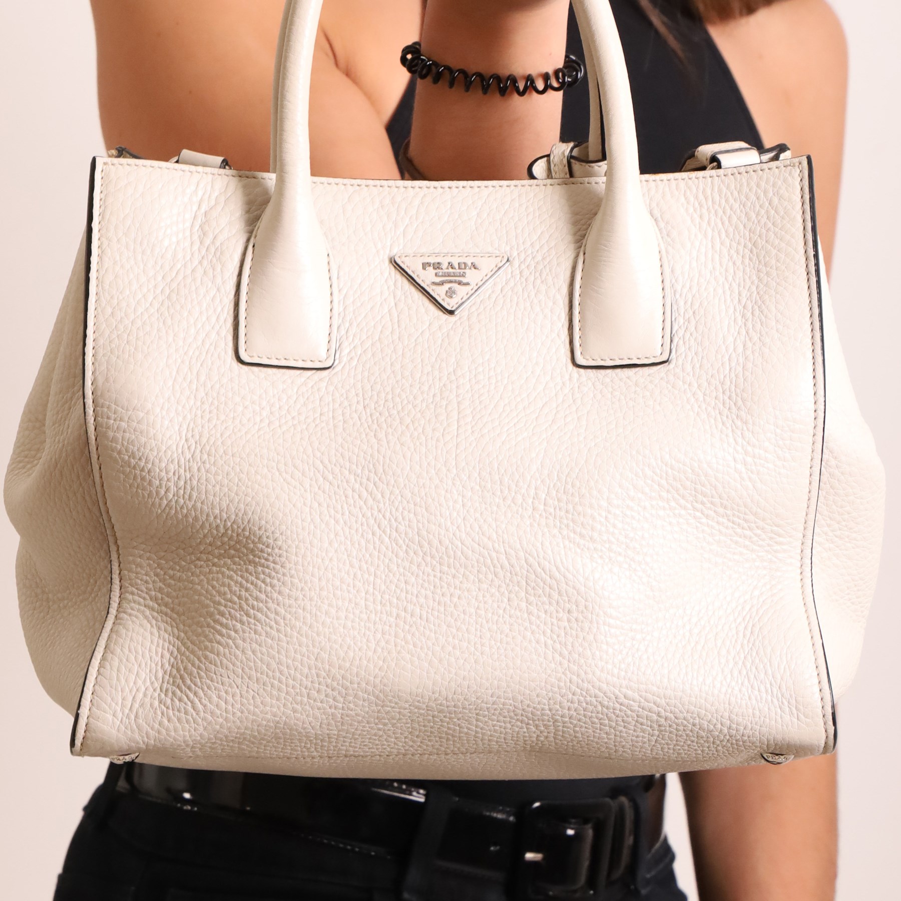 Prada - Vitello Daino shopping tote in Talco pebbled calf leather with contrasting black piping, the softly structured body with twin rolled handles, detachable and adjustable shoulder strap, zip fastening, silver-tone hardware and triangular Prada Milano logo plaque, with original product tag, authenticity card and dust bag