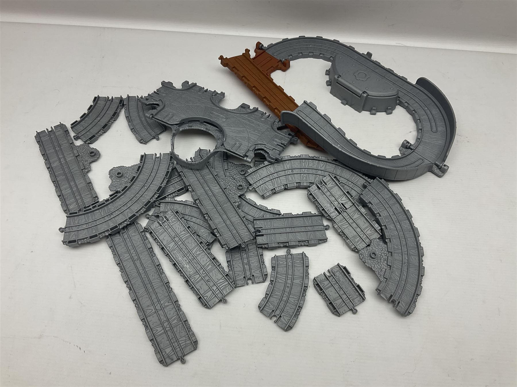 Quantity of Thomas the Tank Engine playsets and track, and Thunderbirds 2004 Tracy Island playset with some associated vehicles, in two boxes 