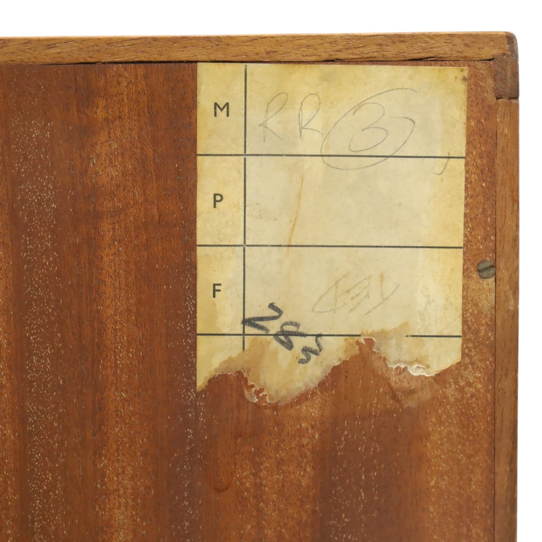Alfred Cox - mid-20th century teak cabinet, rectangular top over two bifold doors with inset handles, opening to reveal three central graduating drawers surrounded by assorted shelves, raised on tapering supports united by H-stretcher, stamped to inside of drawer