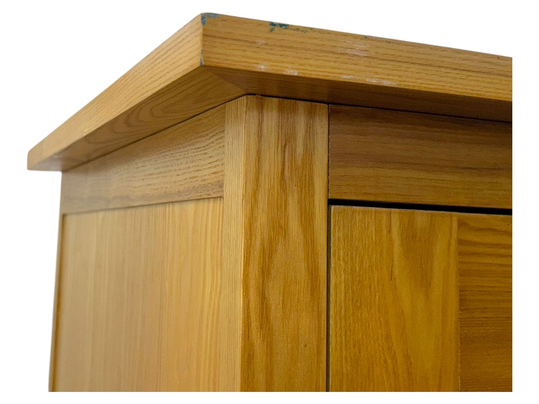 Light oak wardrobe, adjustable clothes rail and single shelf above a single drawer on squared splayed legs